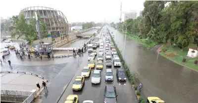  ?? — Reuters ?? Traffic jam is seen after sand storm and heavy rain in Damascus on Thursday.