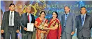  ??  ?? Jlanka Technologi­es Operations Director Gunaseeli Jayasoma with the Gold award for the ‘Best Display of Imported Product’. Also in the picture (from left): Jlanka Corporate Marketing Head Udana Wijeweera Ilangamage, Jlanka Marketing Manager Srinath...