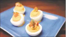  ?? ARIC CRABB/STAFF ?? Deviled eggs and other sumptuous starters make a light, summery bite at Danville Harves, formerly known as Farmer’s Almanact.