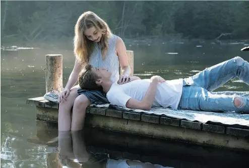  ?? PETER H. STRANKS ?? Colin Ford and Angourie Rice share a tender moment in director Michael Sucsy’s Every Day.