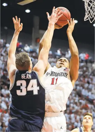  ?? HAYNE PALMOUR IV U-T ?? The Aztecs' Matt Mitchell (11) says beetroot juice doean't taste great, but “it definitely does the trick.”