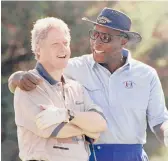  ?? MARCY NIGHSWANDE­R/AP 1993 ?? Then-President Bill Clinton, left, and Vernon Jordan on the course at the Farm Neck Golf Club in Oak Bluffs, Massachuse­tts.