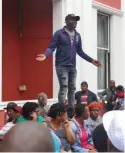  ??  ?? RALLY: Samwu campaigns convener Zola Capucapu addresses striking members outside the city