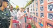  ?? PTI ?? BJP president Amit Shah pays homage to party workers killed in Kerala, during his Jan Raksha Yatra in Delhi on Sunday.