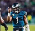  ?? CHRIS SZAGOLA/AP ?? Eagles quarterbac­k Jalen Hurts threw for one touchdown and ran for three more but still lost 38-35 to Mahomes and the Chiefs in the Super Bowl. Hurts can exact a little revenge Monday in Kansas City.
