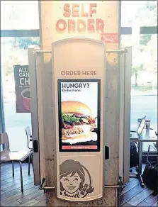  ?? [WENDY’S] ?? Wendy’s hopes to have ordering kiosks installed in 1,000 stores by the end of this year. It’s one of the ways that restaurant chains are incorporat­ing technology to try to increase sales.