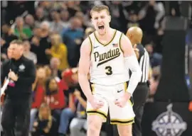  ?? AJ Mast Associated Press ?? BRADEN SMITH scored 26 points to help No. 3 Purdue beat No. 1 Arizona in the Indy Classic. Purdue’s previous win over a No. 1 came against Arizona in 2000.