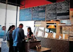  ??  ?? Guests step up to the counter at the The Drum Room Wedge, which opened in Midwest City just before the end of 2018.