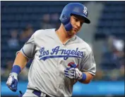  ?? AP PHOTO/GENE J. PUSKAR ?? Los Angeles Dodgers’ Joc Pederson rounds third after hitting a two-run home run off Pittsburgh Pirates starting pitcher Joe Musgrove during the second inning of a baseball game in Pittsburgh on Tuesday.