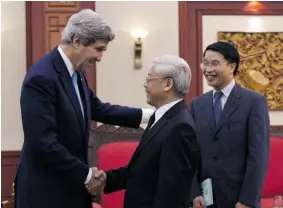  ?? LUONG THAI LINH/ AFP/GETTY IMAGES ?? U.S. Secretary of State John Kerry, left, is greeted by Vietnamese Communist Party Secretary General Nguyen Phu Trong as they meet at VCP’s headquarte­rs in Hanoi on Monday.