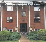  ?? EVAN BRANDT — MEDIANEWS GROUP ?? The front entrance of the Ashwood Apartment building was a burnt-out shell after the July 31 fire.