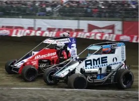  ?? (Nick Oxford/NASCAR) ?? Christophe­r Bell and Tanner Thorson in action during the 2022 Chili Bowl.