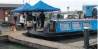  ?? PHOTOS: KEVIN THOMAS ?? The vaccinatio­n ‘booster boat’ and gazebos.