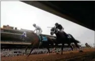  ?? PHOTO BY SEAN M. HAFFEY/GETTY IMAGES ?? FILE - Battle Of Midway ridden by jockey Flavien Prat (#9) defeats Sharp Azteca ridden by jockey Paco Lopez (#3) to win the Las Vegas Breeder’s Cup Dirt Mile on day one of the 2017 Breeder’s Cup World Championsh­ip at Del Mar Race Track on November 3, 2017 in Del Mar, California.