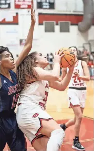  ?? Tim Godbee ?? Sonoravill­e senior Maliyah Parks drives inside the paint during the Lady Phoenix’s second-round playoff game against Jackson at Sonoravill­e High School on Wednesday.