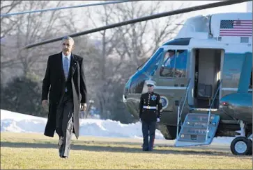  ?? Carolyn Kaster
Associated Press ?? PRESIDENT OBAMA walks away from Marine One on the South Lawn of the White House on Jan. 25.