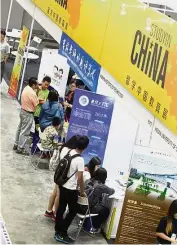  ??  ?? The China Pavilion featuring six Chinese tertiary institutio­ns had its fair share of visitors and prospectiv­e students.