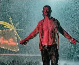  ??  ?? Chris Hemsworth plays a charismati­c cult leader in Bad Times at The El Royale.