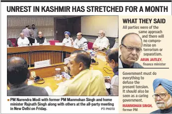  ?? PTI PHOTO ?? PM Narendra Modi with former PM Manmohan Singh and home minister Rajnath Singh along with others at the all-party meeting in New Delhi on Friday.