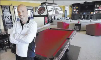  ??  ?? “Tanked” star Brett Raymer included a man cave in his remodeled Las Vegas home.