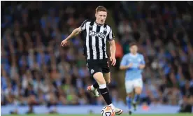  ?? Photograph: Simon Stacpoole/Offside/Getty Images ?? Elliot Anderson in action for Newcastle during their recent loss to Manchester City. The midfielder has played in each of the team’s three Premier League games so far this season.