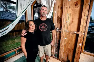  ?? ABIGAIL DOUGHERTY/STUFF ?? Glenn and Tania Karam say they can’t get anyone to take responsibi­lity for the damage to the house they had built new.