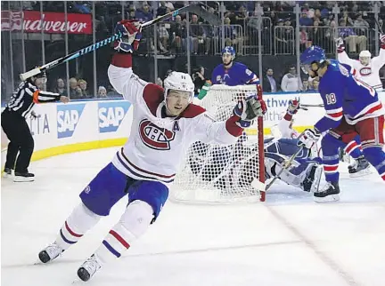  ?? BRUCE BENNETT/GETTY IMAGES ?? The Canadiens’ Brendan Gallagher celebrates a first-period goal by Max Pacioretty (down on ice) that was later disallowed against the New York Rangers at Madison Square Garden in New York City on Sunday.