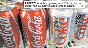  ?? AP ?? PFFFFT!: Coke is not proving to be “it” during the pandemic, with quarterly global sales off 28 percent.