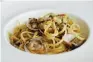  ??  ?? Linguine with clams and bottarga