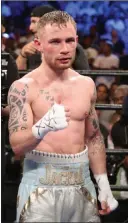  ?? STEVE LUCIANO/ THE ASSOCIATED PRESS ?? Unbeaten featherwei­ght Carl Frampton of Northern Ireland gives a thumbs-up after taking Leo Santa Cruz’s WBA belt by majority decision July 30 at Barclays Center in New York. Their rematch reportedly will be Jan. 28 at the MGM Grand.