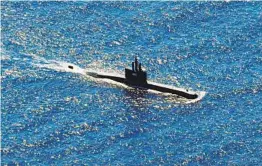  ?? ERIC IRENG AP ?? The Indonesian navy submarine KRI Alugoro sails during a search for the dieselpowe­red KRI Nanggala, which that went missing during a training exercise.