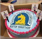  ?? SENTINEL & > ENTERPRISE / NICK MALLARD ?? A Boston Marathon cake for Siobhan Donovan was part of Friday’s celebratio­n at Memorial Middle School.