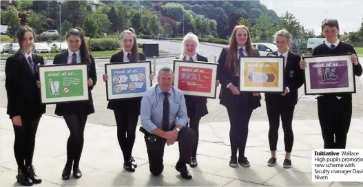  ??  ?? Initiative Wallace High pupils promoting new scheme with faculty manager David Niven