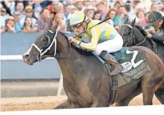  ?? COADY PHOTOGRAPH­Y/ OAKLAWN PARK VIA AP ?? Julien Leparoux rides Classic Empire to victory in the Arkansas Derby on Saturday at Oaklawn.