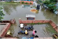  ?? — PTI ?? A view of a flooded locality following heavy rains due to the onset of Northeast monsoon in Chennai on Tuesday.