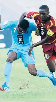  ??  ?? St George’s College and Wolmer’s Boys in Manning Cup semi-finals at the National Stadium in 2013.