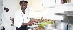  ??  ?? Chef ‘Oliver’ prepares conch fritters, a special at Villa Juanita.