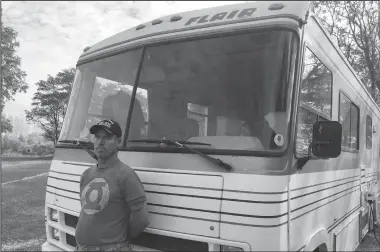  ?? TRIBUNE NEWS SERVICE ?? U.S. Marine veteran Damon Machado has been able to stay at a local campground in this donated motorhome that has helped him out of homelessne­ss. Machado returned from Operation Desert Storm and has since suffered from Post Traumatic Stress Disorder.