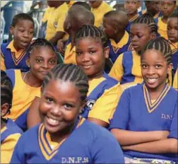  ??  ?? Excited school children of Dominican Group of Schools at the book donation ceremony