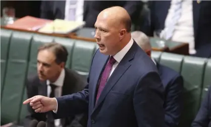  ??  ?? Defence minister Peter Dutton reportedly told an American Chamber of Commerce session Australia and the US need to pool knowledge and resources to develop missile and cyber technology. Photograph: Rod McGuirk/AP