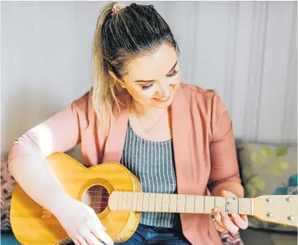  ?? CONTRIBUTE­D • JENNA RACHELLE PHOTOGRAPH­Y ?? Charlottet­own, P.E.I.-based music therapist Shona Pottinger says the challenges that come with virtual sessions do not outweigh its benefits, as even the act of listening to music and socializin­g helps combat pandemic loneliness.