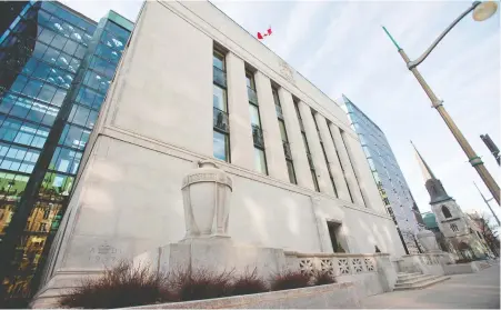  ?? AFP VIA GETTY IMAGES FILES GEOFF ROBINS/ ?? The Bank of Canada is being urged to avoid “ideologica­l” debates as it bought $168 billion in government bonds since the pandemic hit.