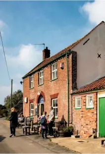  ??  ?? The traditiona­l Nelson Head pub offers a welcoming open fire at the end of a walk.