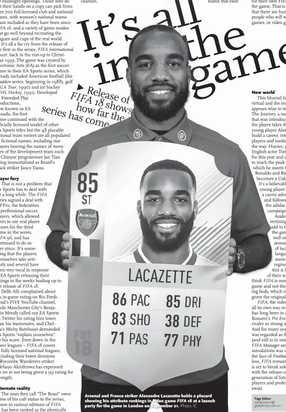  ?? Photo: IC ?? Arsenal and France striker Alexandre Lacazette holds a placard showing his attribute rankings in video game FIFA 18 at a launch party for the game in London on September 21.