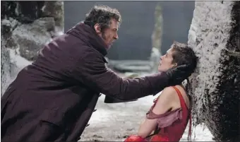  ?? Universal Pictures ?? Hugh Jackman stars as Jean Valjean and Anne Hathaway as Fantine in Les Miserables, in theatres Dec. 25.