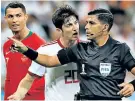  ??  ?? Confusion: Enrique Caceres changed correct decisions in Portugal v Iran