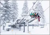  ?? KARL MONDON — BAY AREA NEWS GROUP ?? Skiers ride the KT-22lift at Palisades Tahoe in Olympic Valley on Christmas Eve in 2021. An expansion plan at the resort could draw an estimated 300,000visitor­s a year.
