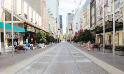  ?? Photograph: Chris Putnam/Rex/Shuttersto­ck ?? ‘In August, the Melbourne CBD moved into stage-four lockdown and most economists believed this would surely see unemployme­nt rise. And yet not only did the national unemployme­nt rate fall, but the rise in Victoria was small.’