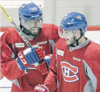  ?? J O H N MAHO N E Y ?? P. K. Subban, left, jokes with Alex Galchenyuk during practice Friday. Coach Michel Therrien criticized Subban for losing the puck during Wednesday’s game, which led to the winning goal in a 3- 2 loss to Colorado.