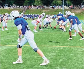  ?? Scott Ericson / Hearst Connecticu­t Media ?? The Newtown football team scrimmaged Greenwich on Saturday in Newtown.